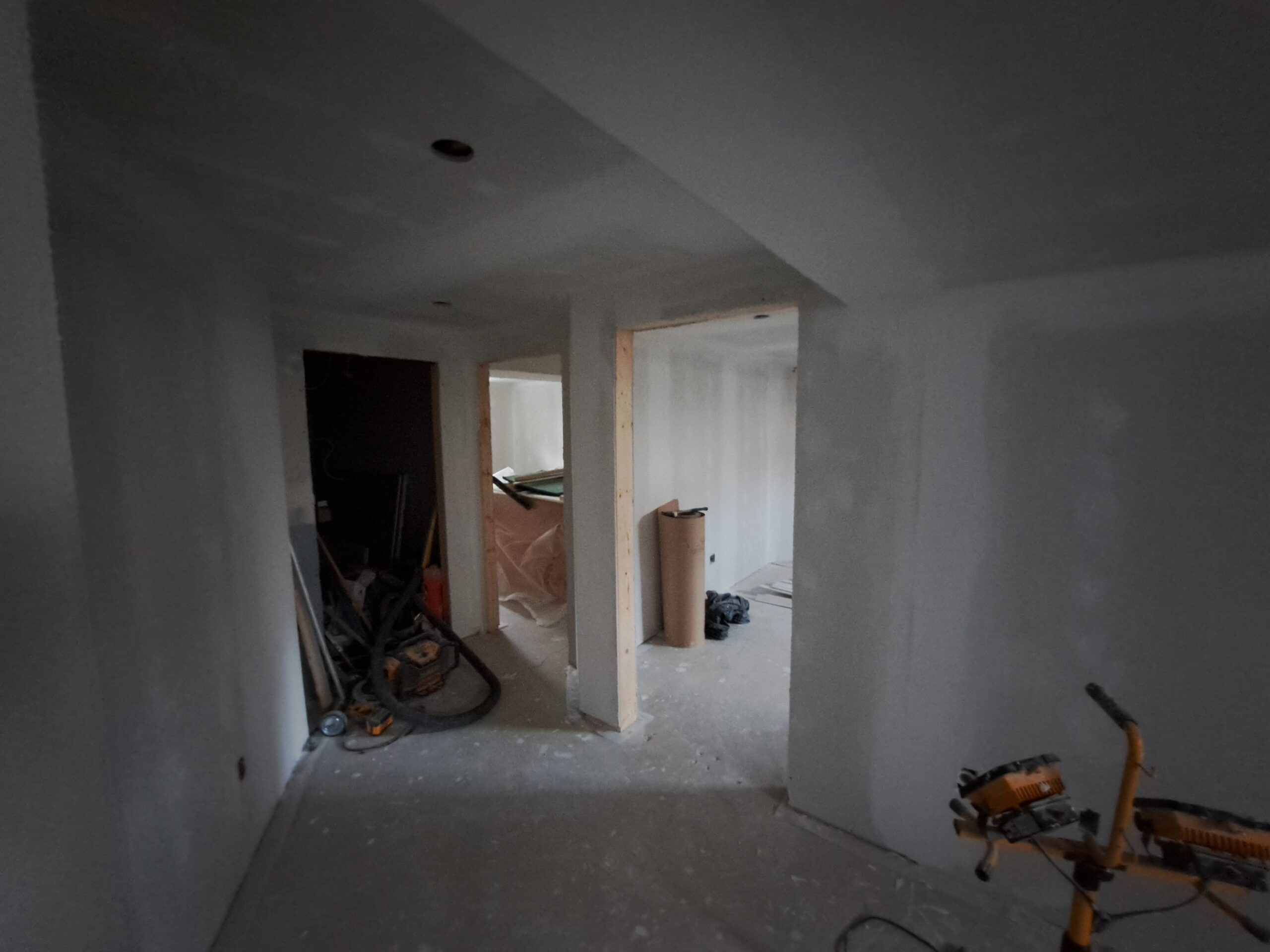 before image basement renovation after drywall installation