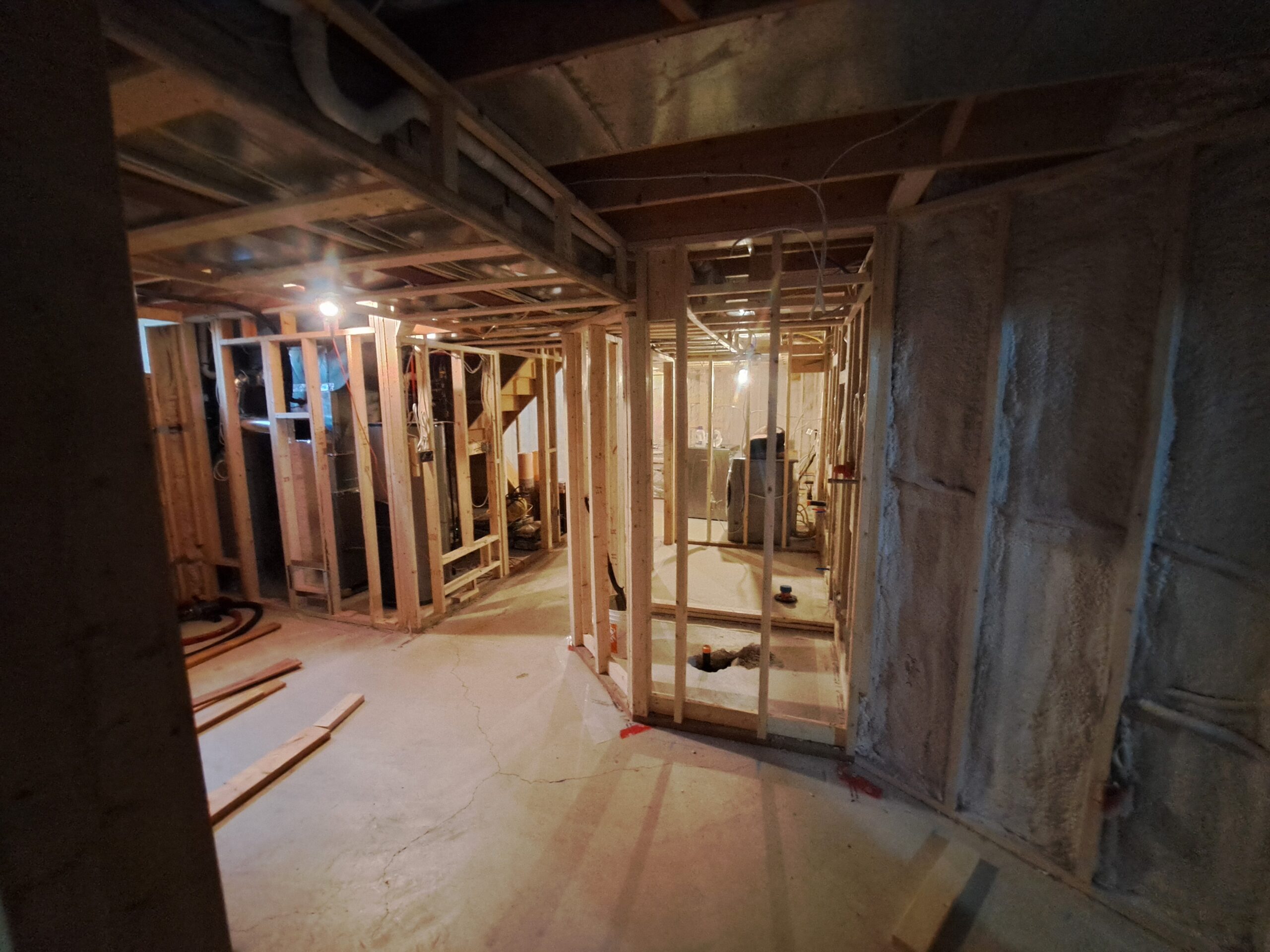 Open concept basement framing layout with partitions bathroom load bearing structure insulated wallls